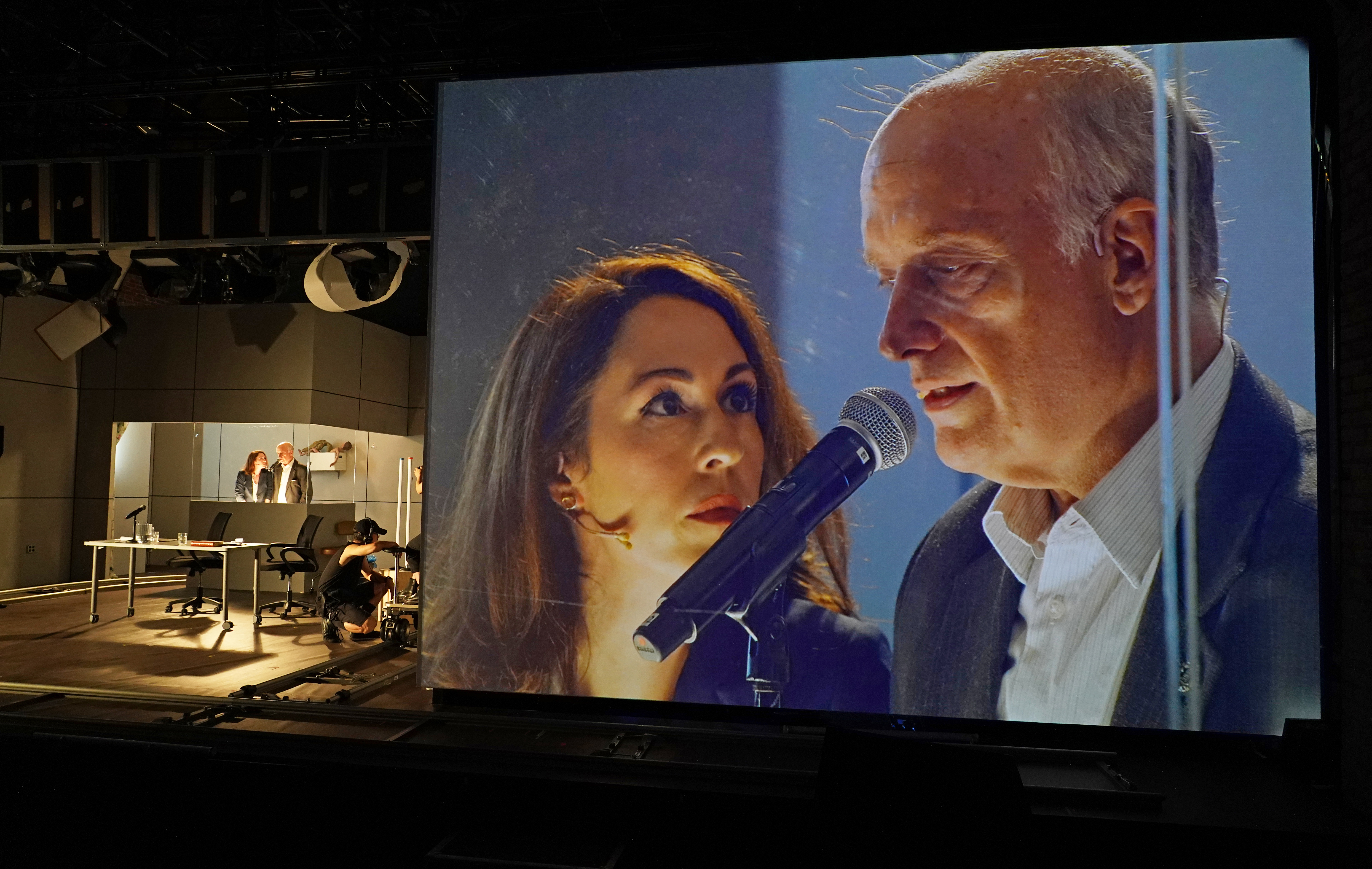 Kelley Curran and Frank Wood, on stage and on screen, in The Meeting: The Interpreter. Photo by Carol Rosegg.