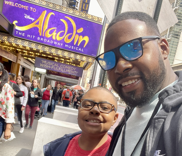 Kevin Chimilio and his son, Brandon, outside Aladdin before an autism-friendly performance. Photo courtesy of the family.